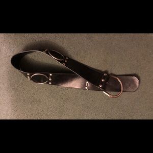 Wide black belt with metal hoops